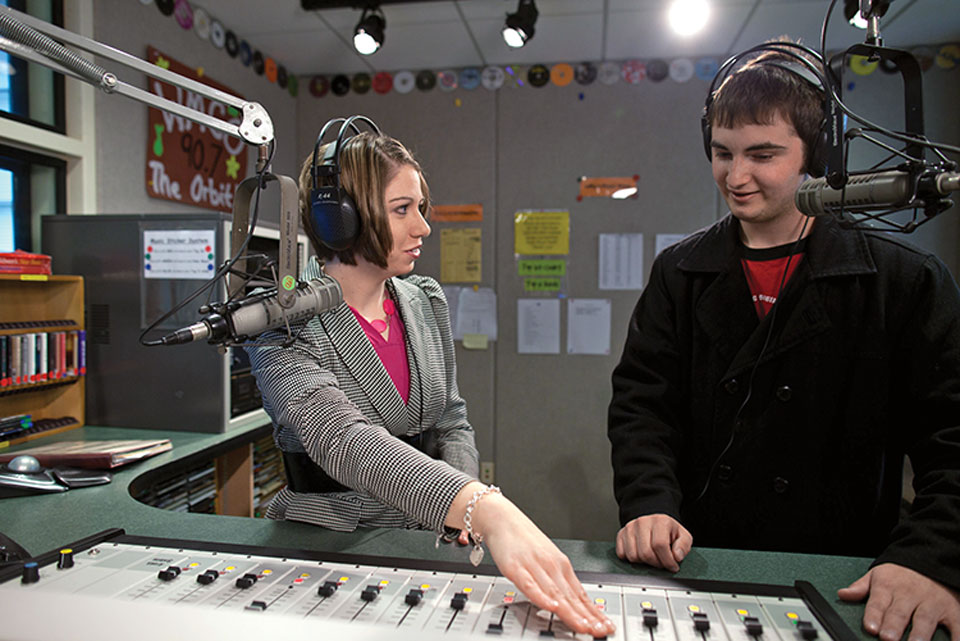 Lisa Marshall in the studio with a student