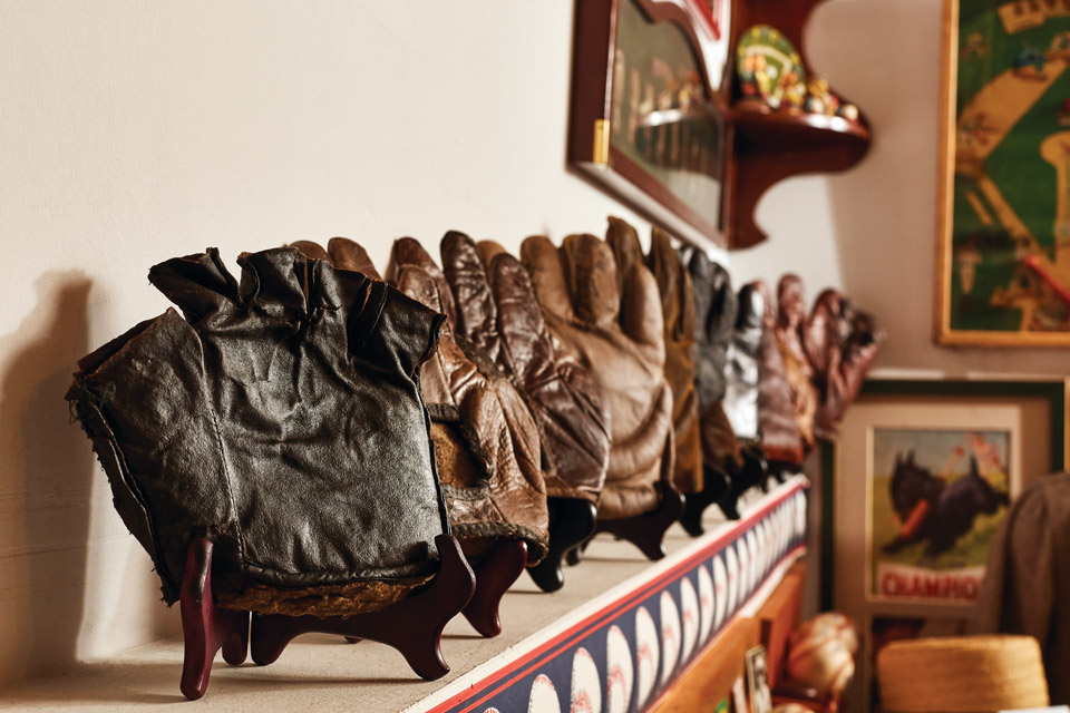 display of vintage baseball gloves