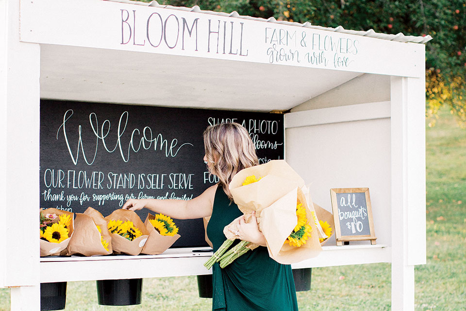 Bloom Hill Farm, Shannon setting out sunflowers (photo courtesy of Bloom Hill Farm)