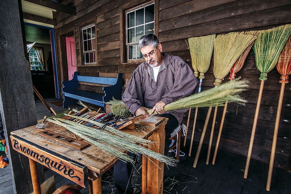 Man working at Zoar Village (photo by Andy Donaldson)