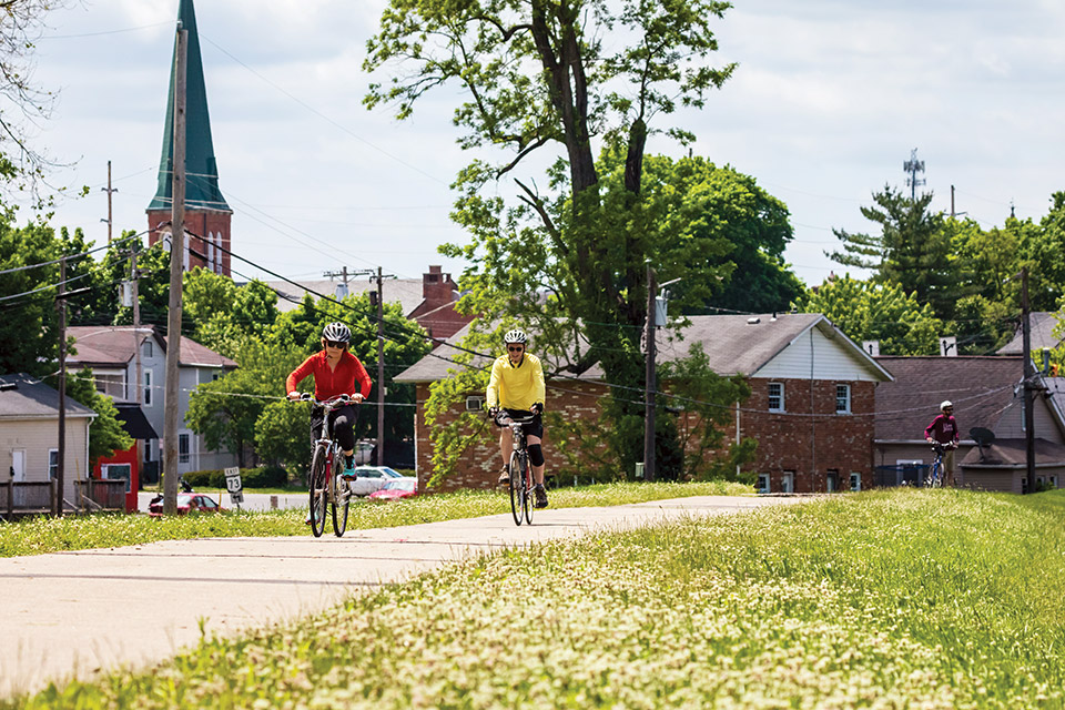 Two people cycling in Franklin (photo by Andy Snow)