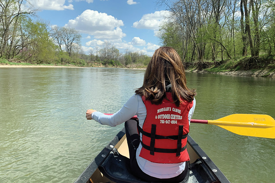 Woman canoeing on the Little Miami River (courtesy of Morgan's Canoe & Outdoor Adventures)