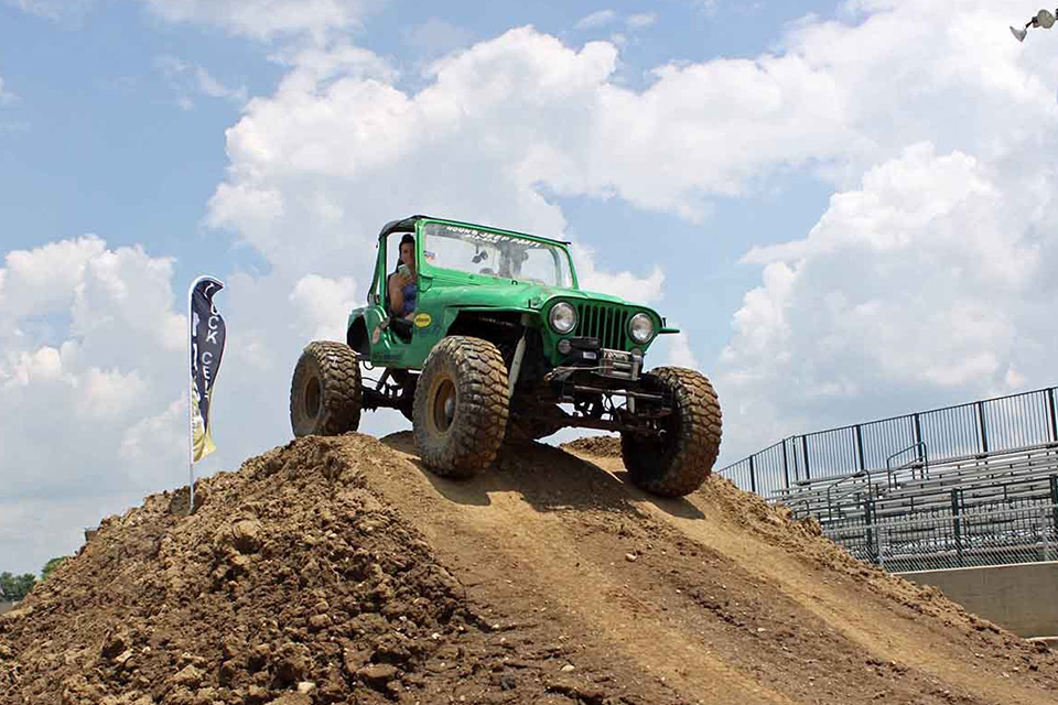 Jeep on dirt mound (photo courtesy of Jeep Fest)