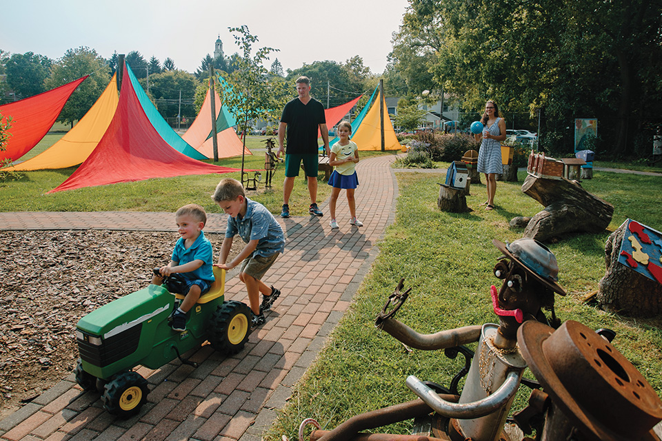 Family playing at Boardman Arts Park