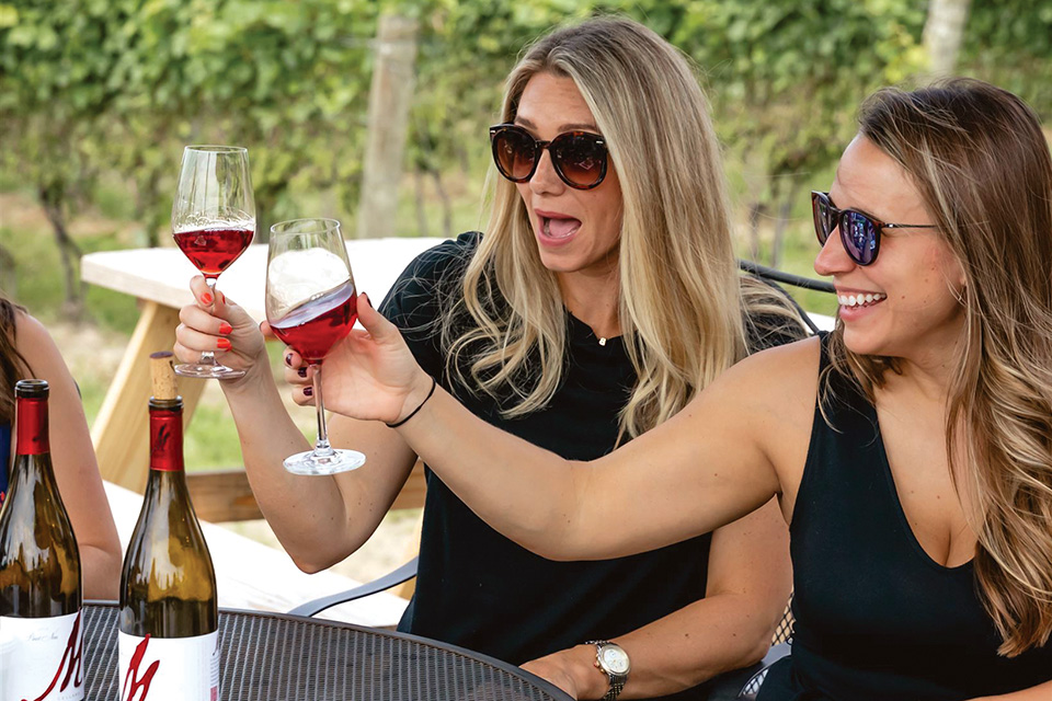 Women trying wines wine at M Cellars in Geneva (photo courtesy of M Cellars)