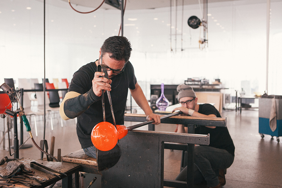 Men working on glass project (photo courtesy of Toledo Museum of Art)