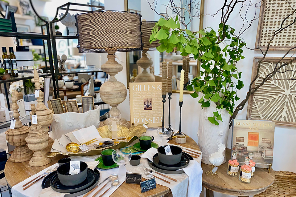 Interior display of bowls, lampstands, books, etc. at Gather by Angel 101 in Perrysburg (photo by Shelby Lahey)