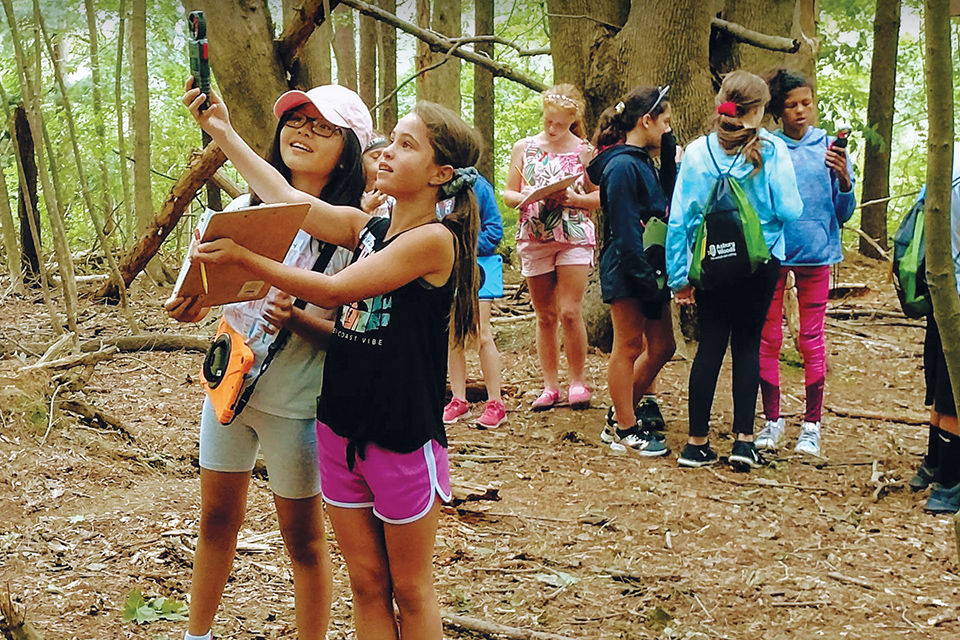 Kids at Erie, Pennsylvania’s Asbury Woods (photo courtesy of VisitErie)