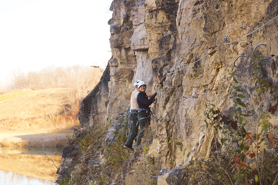 People climbing the urban via ferrata at Quarry Trails Metro Park (photo by Tony Jackson)