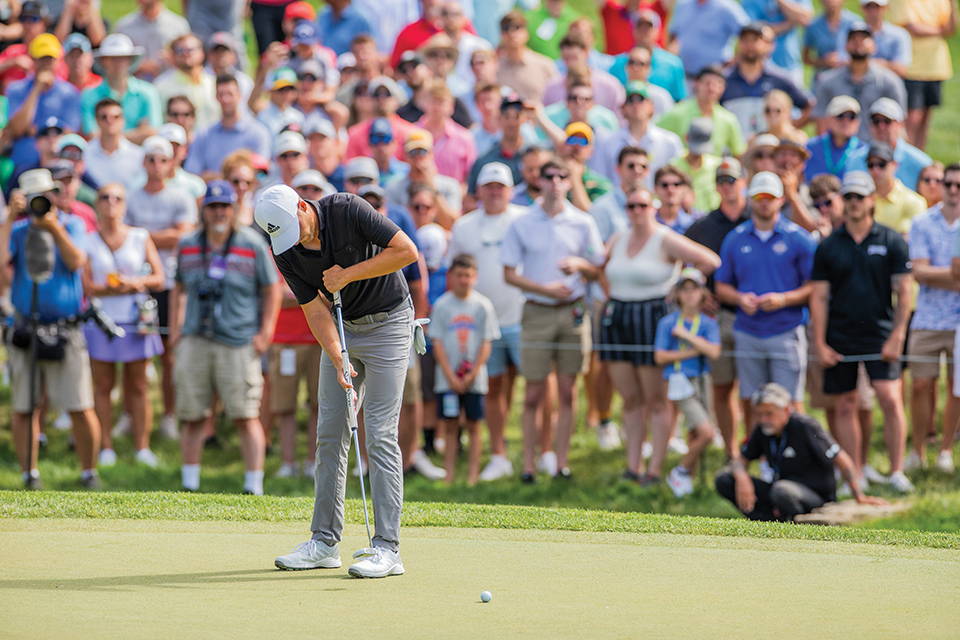 Man golfing in the Memorial Tournament in Columbus (photo courtesy of the Memorial Tournament)