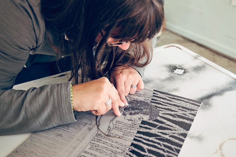 Emily Cooper of Cincinnati’s Emily Cooper Creations working on a carving (photo by Perry Holser)