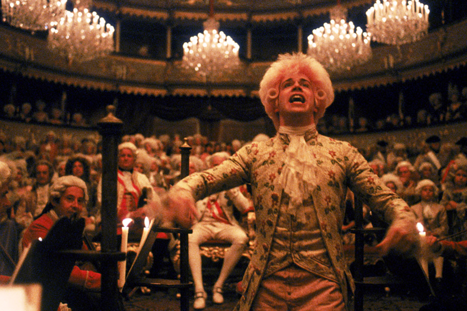 Tom Hulce portraying Mozart in 