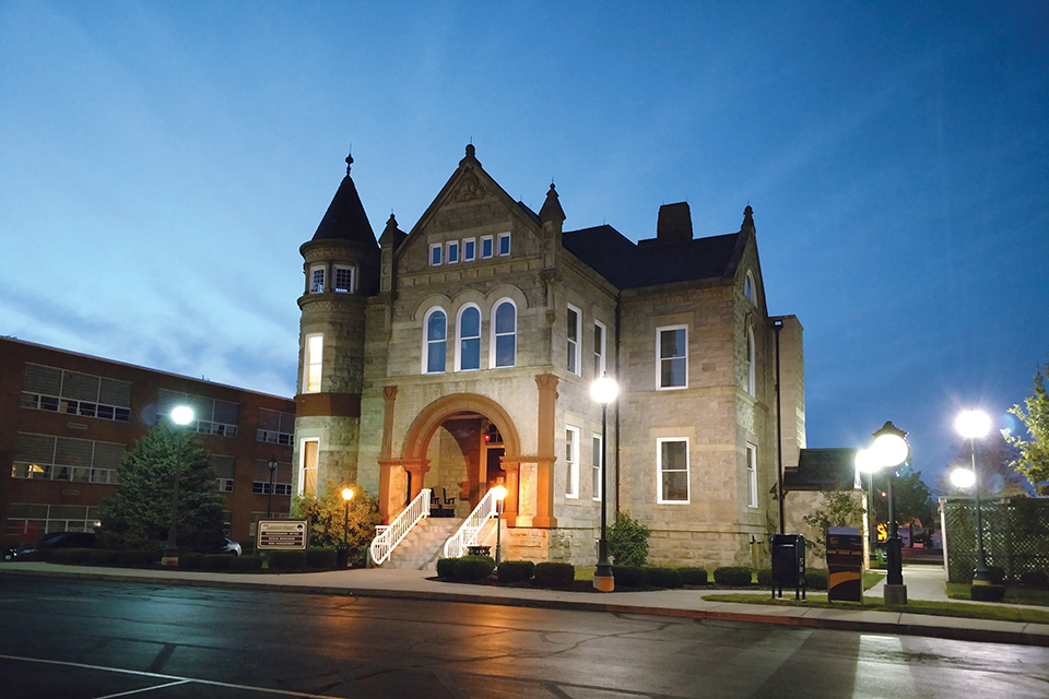 Exterior of Fremont’s Sandusky County Courthouse at dusk (photo courtesy of Sandusky County Historic Jail & Dungeon Tour)