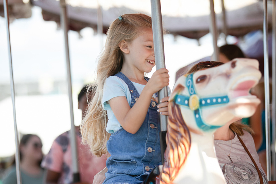 Child on carnival ride at Obetz Zucchini Fest (photo courtesy of Obetz Zucchini Fest)