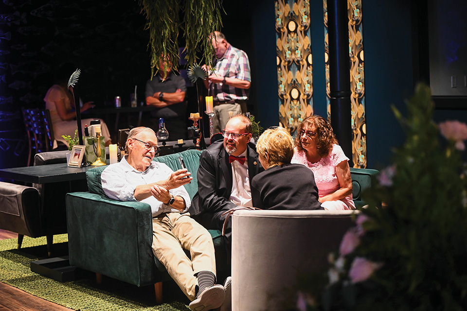 People socializing at Dark Room Brewing Co. in Geneva (photo by Martello Photography)