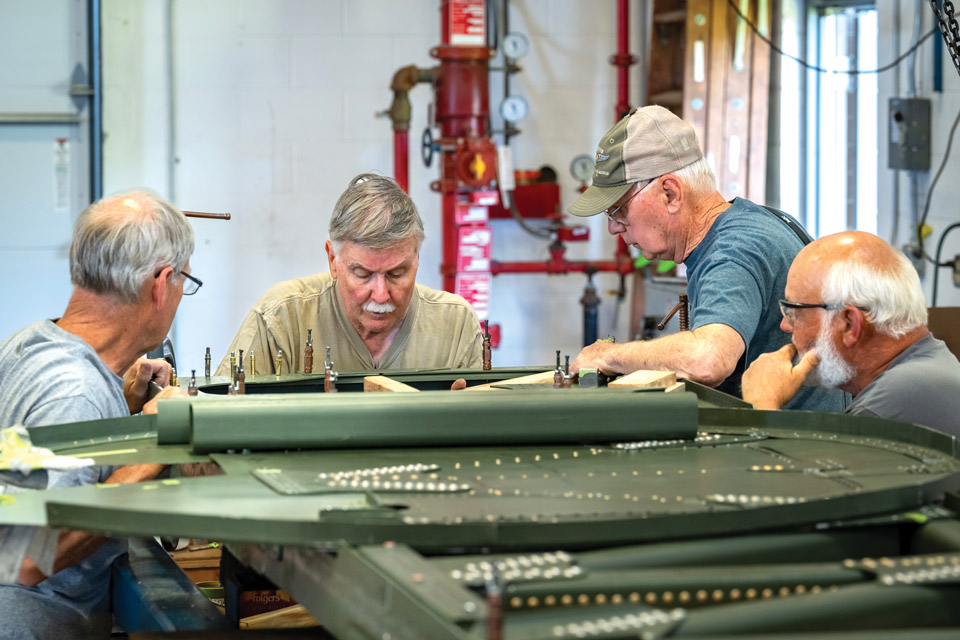 Volunteers working on restoration at the Champaign Aviation Museum in Urbana (photo by Doug Hinebaugh)