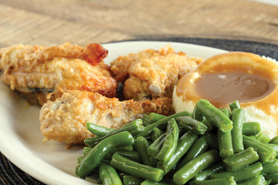 Fried chicken, green beans and mashed potatoes at Boyd & Wurthmann Restaurant in Berlin (photo courtesy of Boyd & Wurthmann Restaurant)