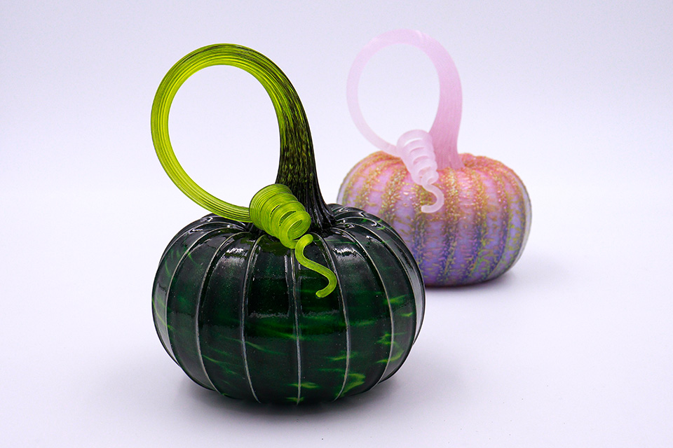 Artist Jack Pine’s Elphaba (left) and Glinda (right) pumpkins (photo courtesy of Jack Pine Studio)