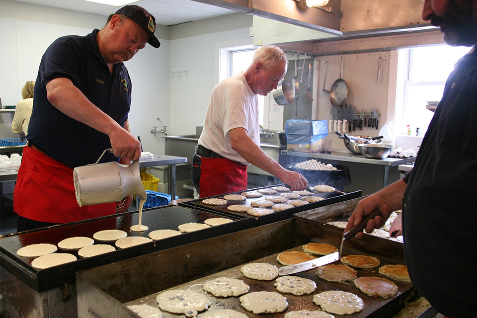 Making Breakfast at Pancake Town USA (courtesy of Burton Chamber of Commerce)