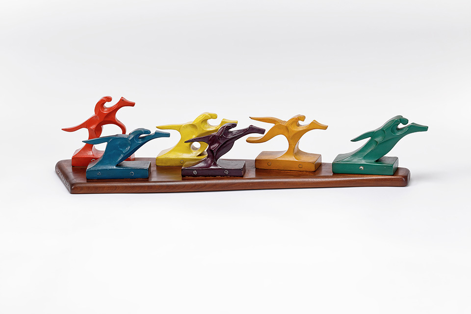 The Race, 1925 Painted wood on walnut base 6 3/4 x 30 3/4 x 8 1/2 in. (Photography by Eoin O’Neill)