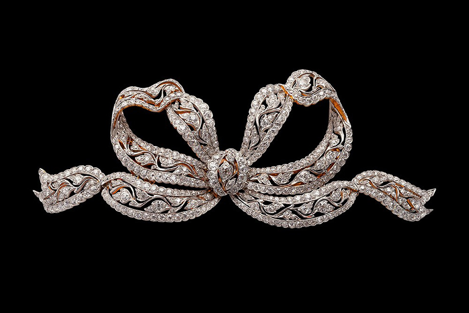 Tiffany & Co. (American, established 1837), large bow corsage or hair ornament. Platinum, gold, and diamond, 1905. Collection of Neil Lane.