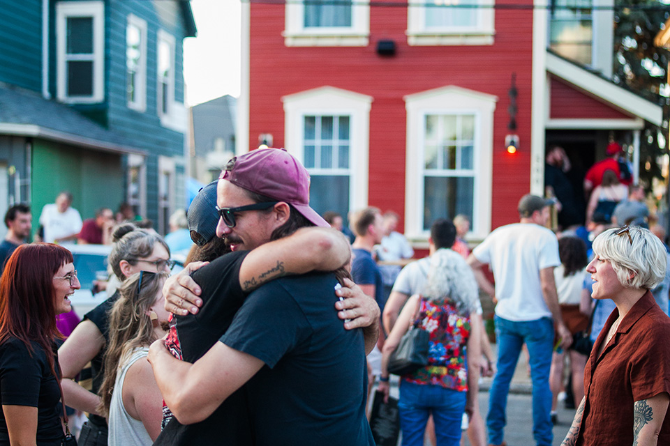 People outside Sweeney’s Walnut Street Tavern in Columbus’ Franklinton neighborhood (photo by Melody Grames of Melody Kay Photo)