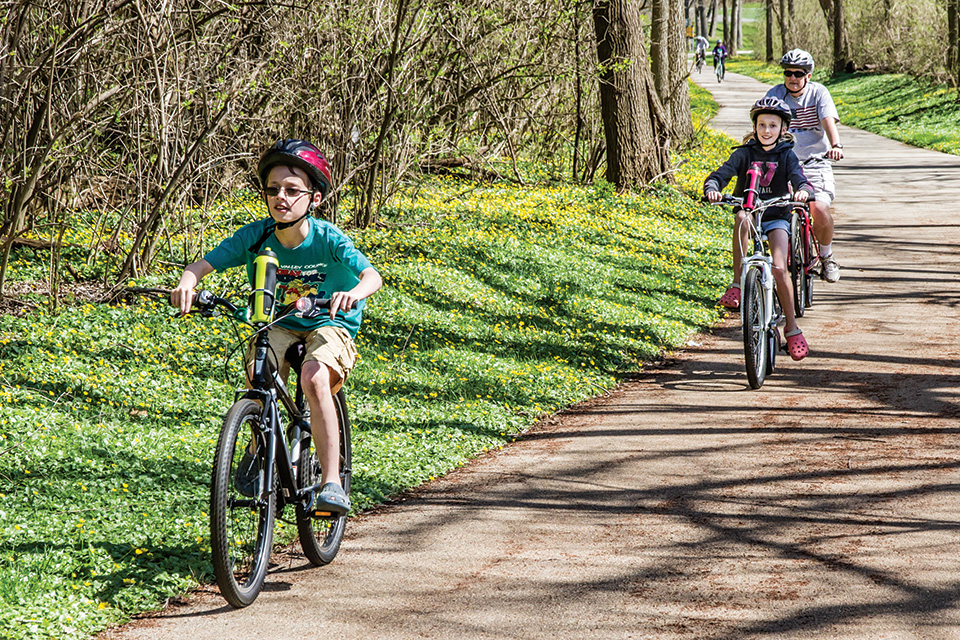 Family biking on Miami Valley Trails in Dayton (photo courtesy of Miami Valley Trails)