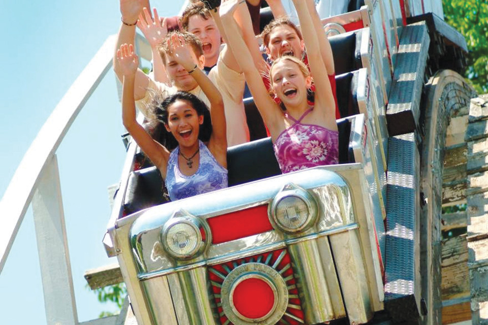 People on roller coaster at Camden Park in Huntington, West Virginia (photo of Huntington Area Convention and Visitors Bureau)