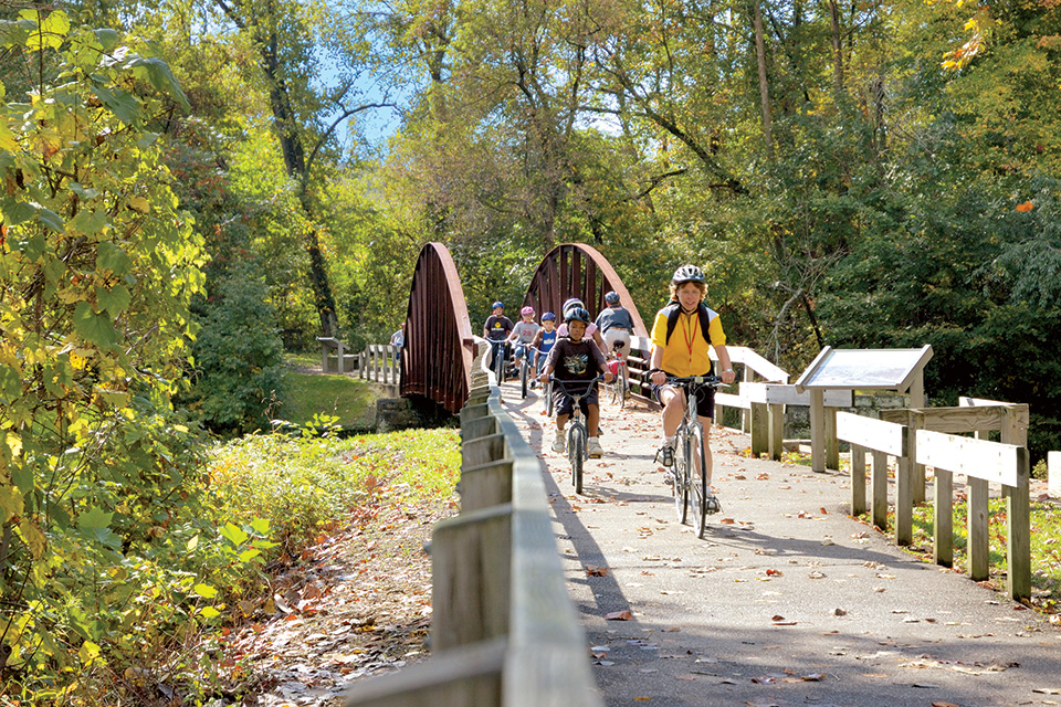 People biking on the Ohio & Erie Canal Towpath Trail in Akron (photo courtesy of Stay in Akron)