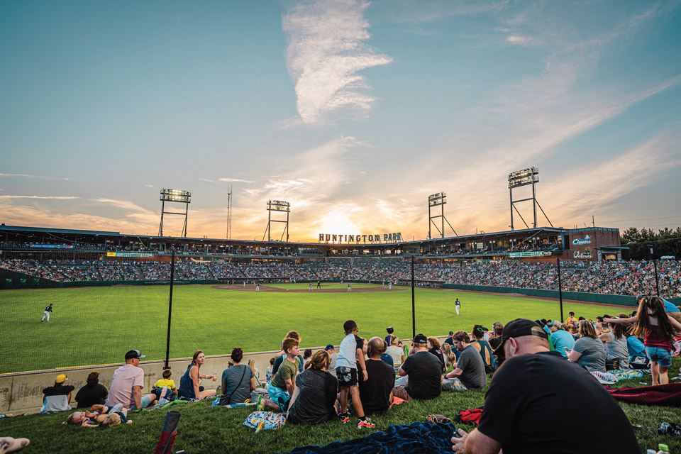 A crowd sits just beyond the outfield at Columbus Clippers’ Huntington Park (photo courtesy of Experience Columbus)