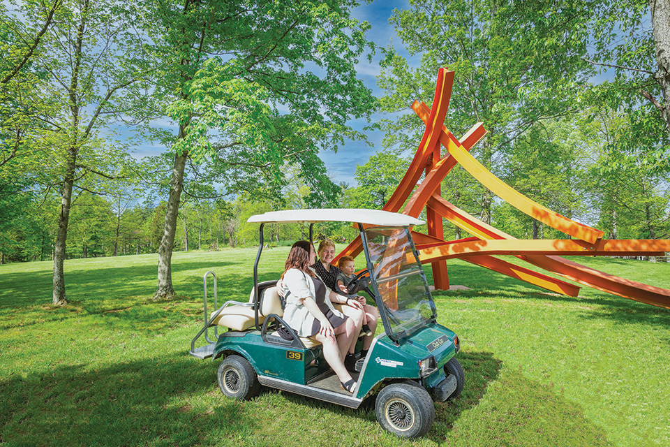 Visitors drive an Art Cart at Pyramid Hill Sculpture Park & Museum in Hamilton (courtesy of Travel Butler County, Ohio)
