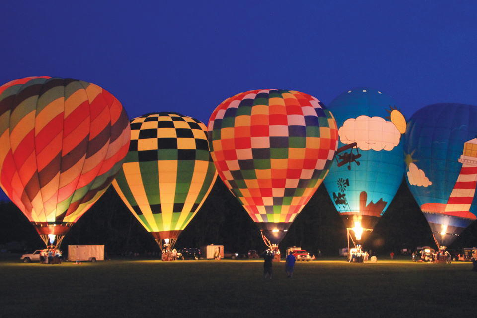 Hot air balloons at dusk at Ashland BalloonFest in Ashland (photo courtesy of Explore Ashland)