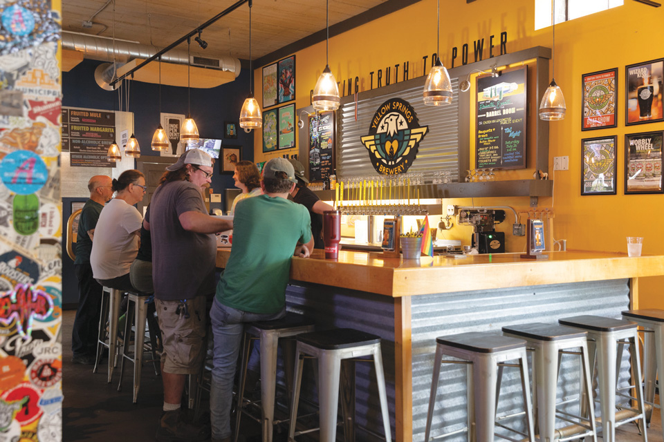 People sitting at the bar at Yellow Springs Brewery in Yellow Springs (photo by Matthew Allen)