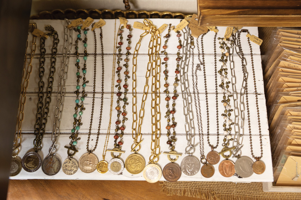 Coin necklaces at Singapore Seahorse Coin Jewelry in Yellow Springs (photo by Matthew Allen)