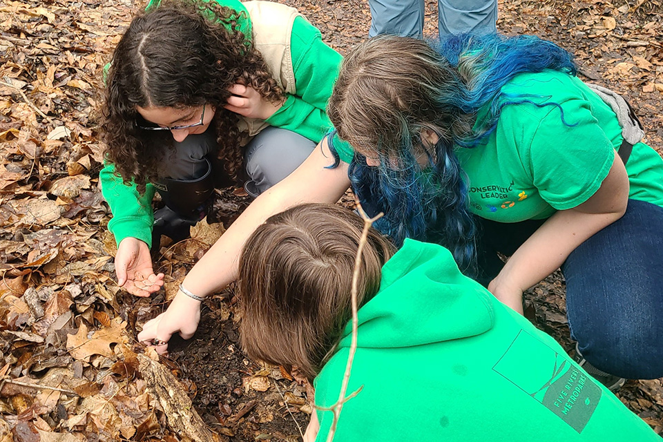 Girls at Woodpecker Watch event in Vandalia’s Taylorsville Metropark (photo courtesy of Five Rivers Metroparks)