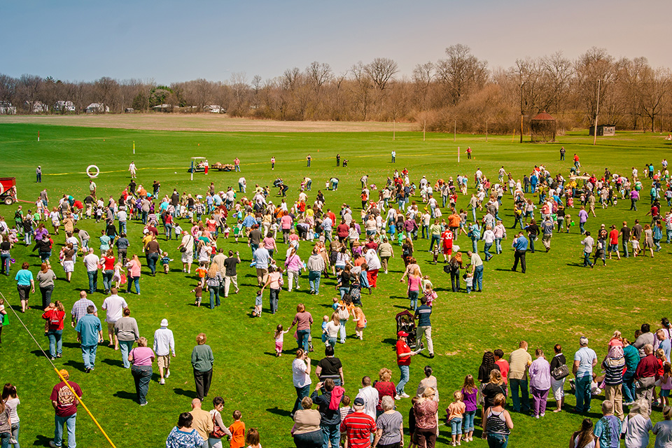 Families hunting for eggs at Young’s Jersey Dairy (photo courtesy of Young’s Jersey Dairy)