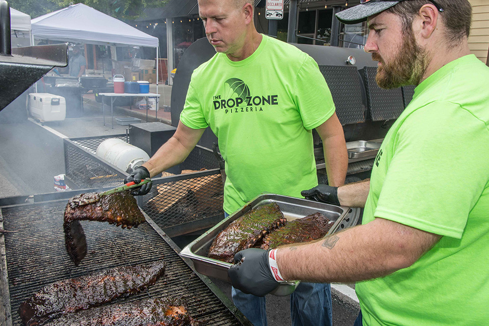 Men cooking ribs at Defiance Rib Fest in Defiance (photo by Jerry Latta)