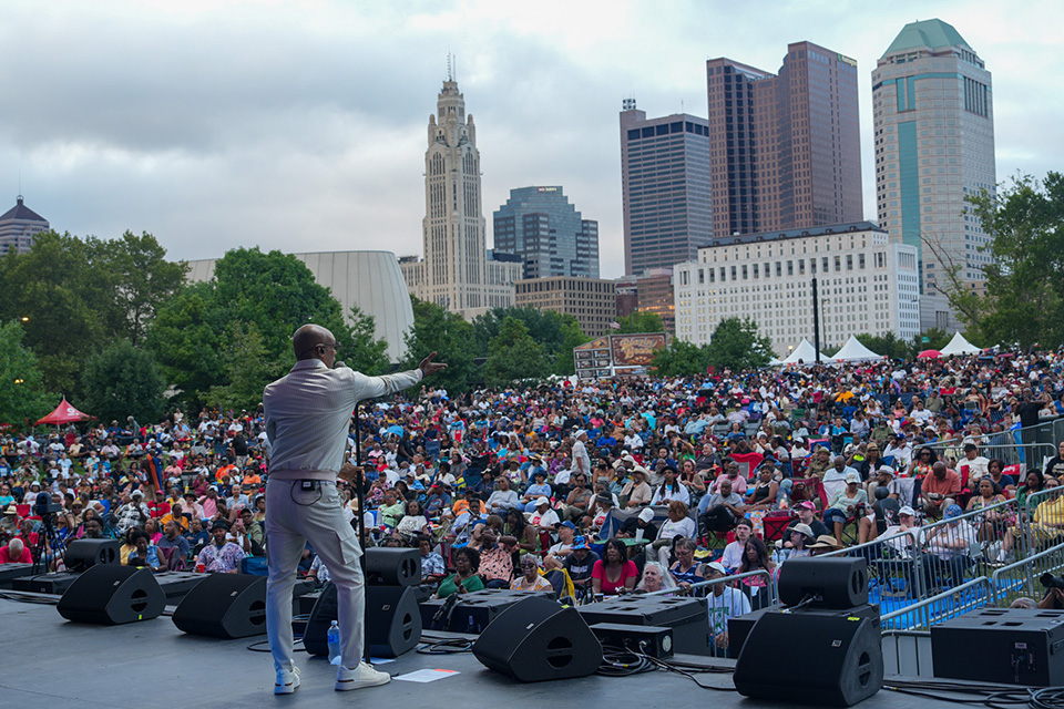 People at performance at Columbus Jazz & Rib Fest (photo by Man making ribs at Columbus Jazz & Rib Fest (photo by Morgan Castleberry, Columbus Recreation and Parks Department)