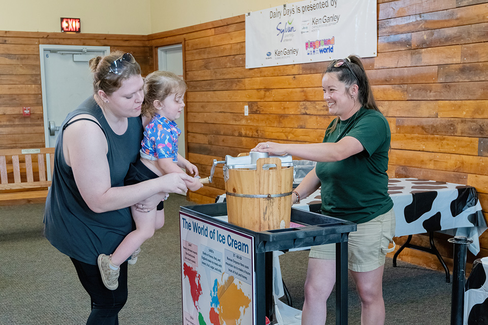Mom and daughter at Lake Metroparks’ Farmpark Dairy Days in Kirtland (photo by Joan T. Neubecker)