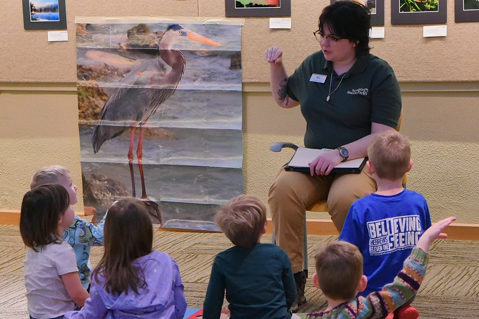 Kids listening to story at Kinderrealm: Clever Crows at F.A. Seiberling Nature Realm in Akron (photo by R. Whinnery)