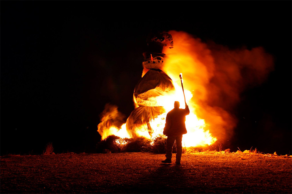 Snowman effigy burning at Burning Snowman Festival in Port Clinton (photo by Dominic Sberna, courtesy of event)