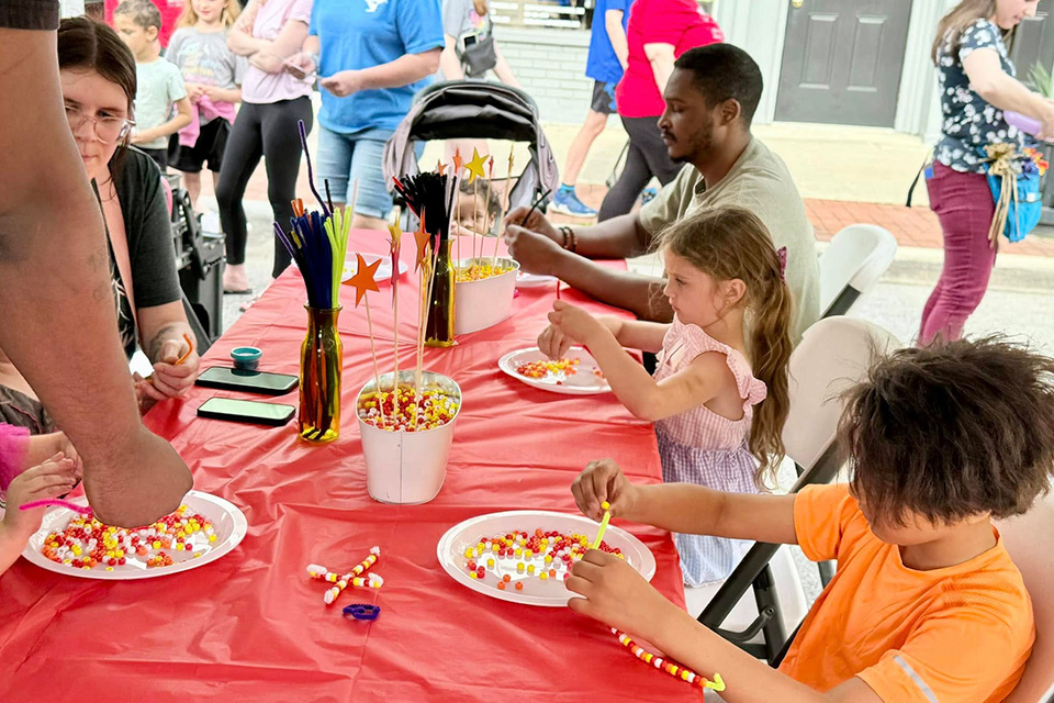 Children making crafts at Taste of the Arts (photo courtesy of Main Street Piqua)