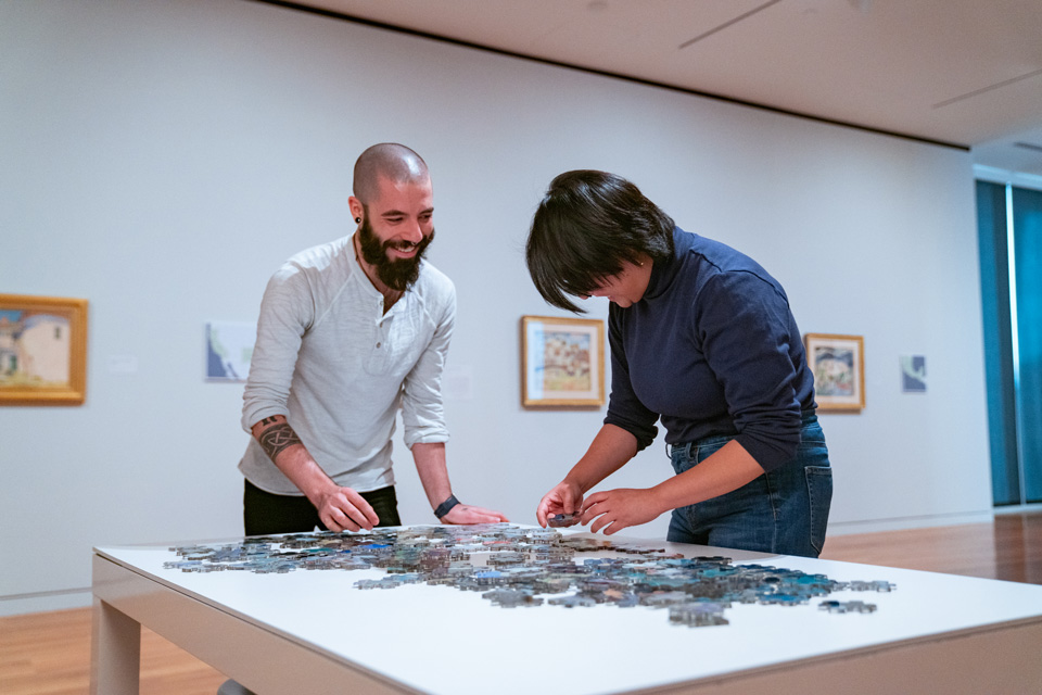 Couple doing a puzzle at the Columbus Museum of Art (courtesy of Columbus Museum of Art)
