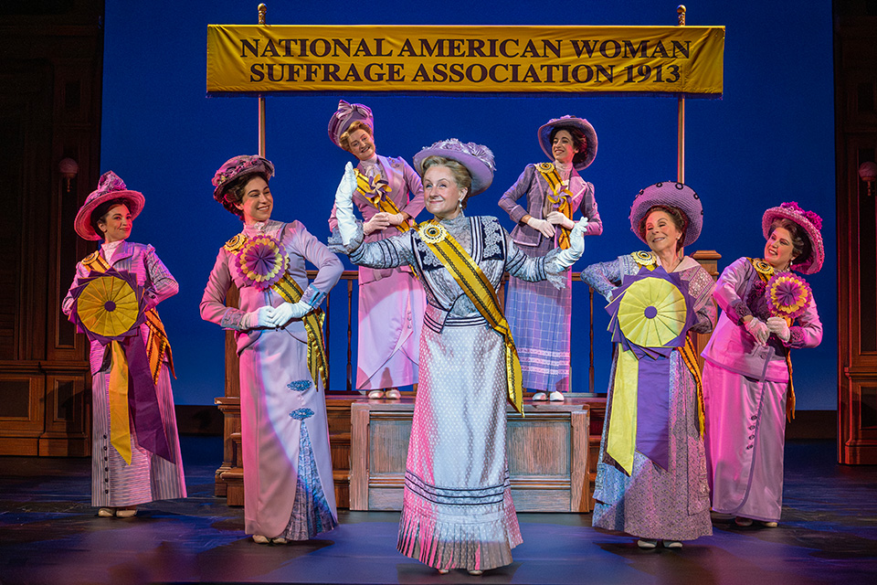 Group of women performing on stage during Suffs (phot0 by Joan Marcus)