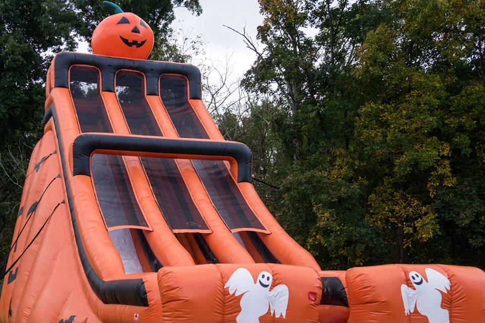 An inflatable pumpkin slide at the Old West Pumpkin Fest (photo by Sarah Zietlow, courtesy of Rockin’-R-Ranch)