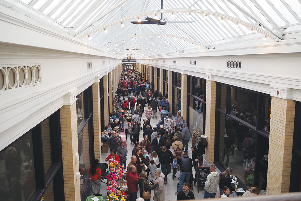 Crowd inside Newark Arcade in Newark (photo by Schooley Caldwell)