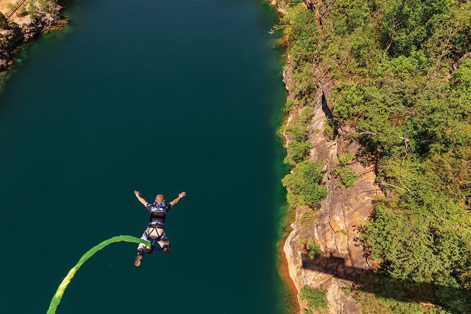 Person bungee jumping at The Great Bungee Co. in Harpers Ferry, West Virginia (photo by Love & Sol Photography)