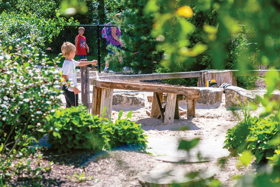 Kid playing at Nature Play at Penitentiary Glen Reservation in Kirtland (photo by CLEWITHKIDS)