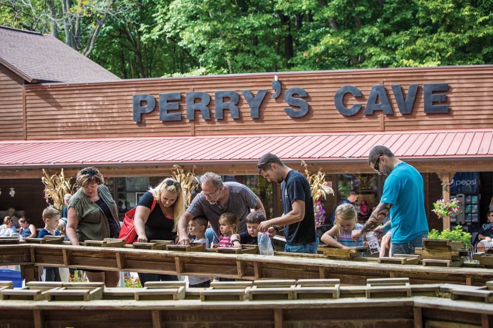 Families outside of Perry’s Cave Family Fun Center in Put-in-Bay (photo by Laura Watilo Blake)