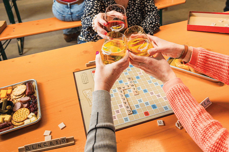 People playing Scrabble at Crafted Artisan Meadery in Mogadore (photo by Laura Watilo Blake)
